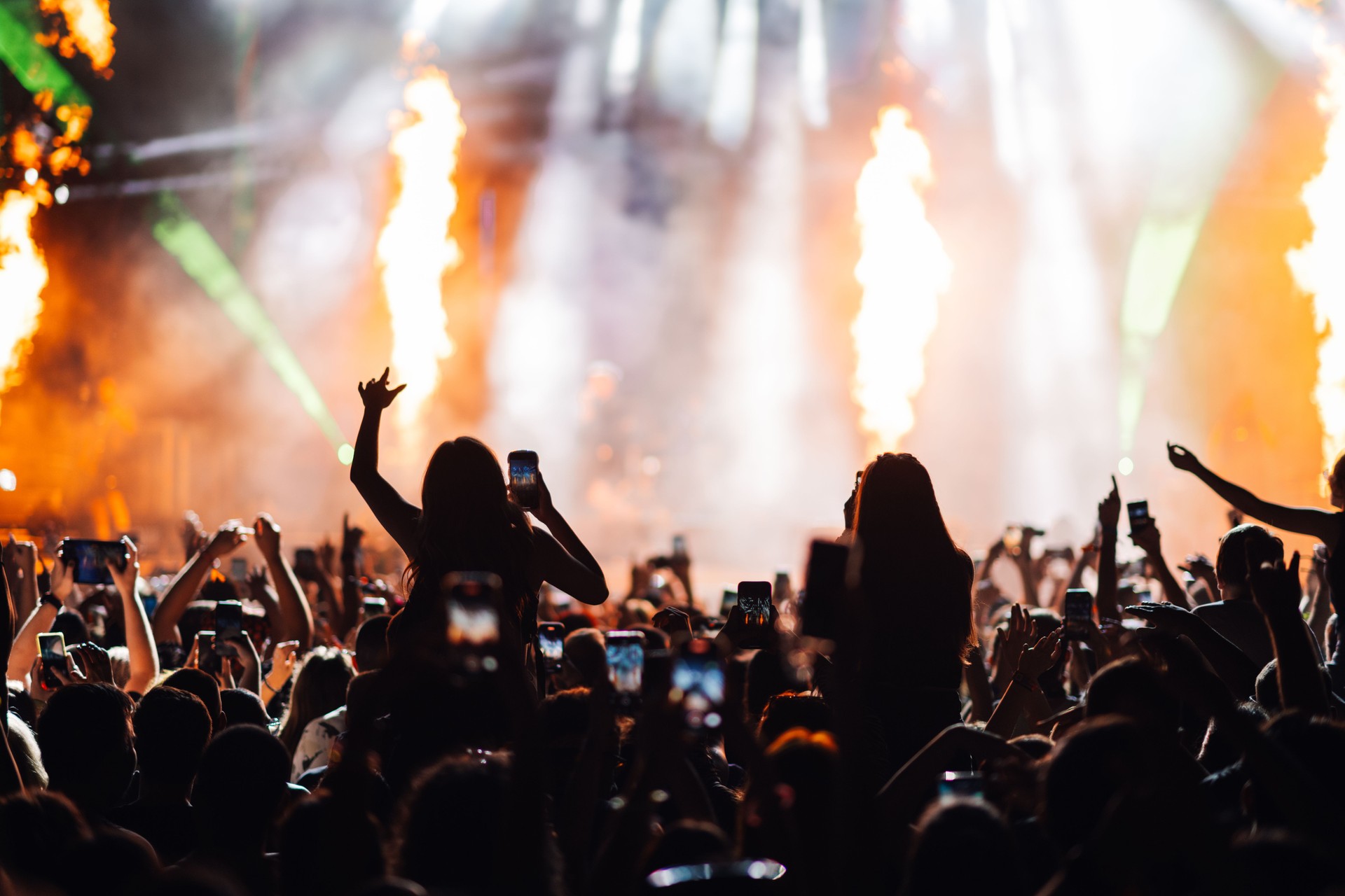 Vibrant stage performance with a captivated audience